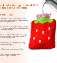 Compact hot water bag with strawberry design for pain relief.