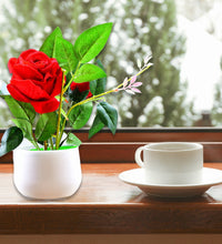 Artificial rose plant in a decorative pot