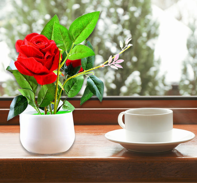 Artificial rose plant in a decorative pot