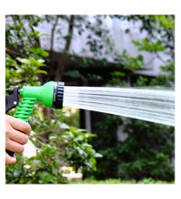 Garden hose nozzle with connector and tap adapter.