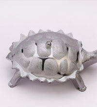 Tortoise-shaped container for dry fruits or presents.