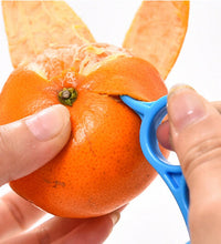 Ring-shaped peeler for oranges, snail design.