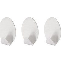 Self-adhesive wall hooks, pack of 3, strong hold.