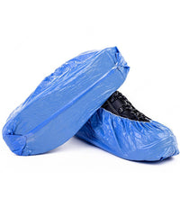 Pack of disposable shoe covers with elastic top for rainy weather.