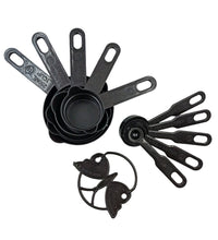 Black plastic measuring cups and spoons set with an 11-piece collection, including a butterfly-shaped holder