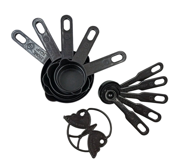 Black plastic measuring cups and spoons set with an 11-piece collection, including a butterfly-shaped holder