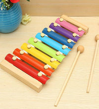 xylophone bars with vibrant colors and wooden base