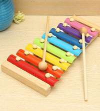 Xylophone set arranged with colorful bars and mallet for play