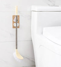 Magic sticker mop and broom holder for keeping cleaning tools organized.