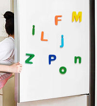 Colorful magnetic letters on a whiteboard