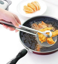 Multi-functional stainless steel filter spoon with clip.