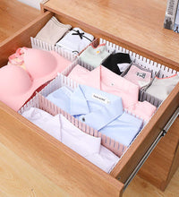 Dividers and organizers for kitchen drawers in a set.