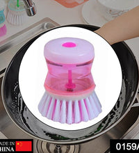 Kitchen cleaning brush with liquid soap dispenser for convenience