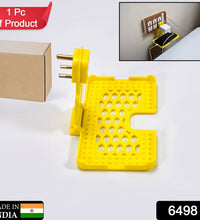 Yellow wall holder stand for mobile charging.