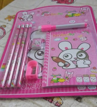 Wooden pencils and sharpener set for kids, includes eraser and diary.