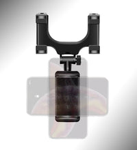 Vehicle rear view mirror mobile stand for hands-free use