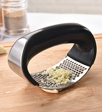 Durable stainless steel garlic crusher in vibrant colors.