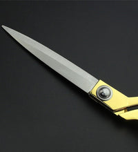 Gold-plated professional scissors for seamless fabric cuts.