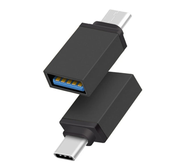 Type-C OTG adapter for data transfer and charging.