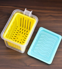 Clear kitchen storage containers with handles for organized fridge space