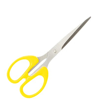 Scissors in use, demonstrating their cutting efficiency and comfortable handle grip