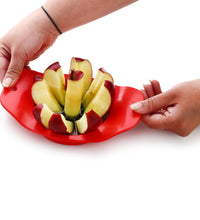 Apple cutter by Ganesh, plastic and stainless steel, colors may vary.