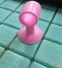 Mini silicone door stopper with anti-collision crash pad.