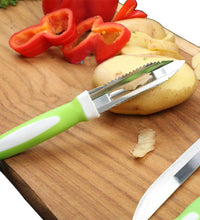 Durable stainless steel knife set with peeler and stand.