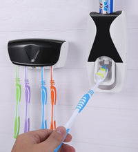 Toothpaste dispenser with brush set