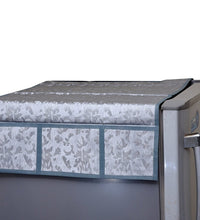 Decorative refrigerator top cover with assorted designs.