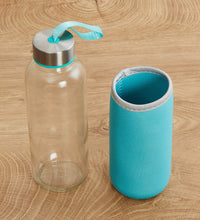 Stylish glass water bottle, 500 ml, with a protective cover.