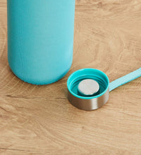 Eco-friendly glass water bottle with cover, 500 ml capacity.