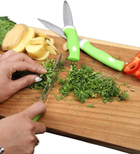 Elegant stainless steel knife and peeler set for home use.