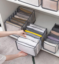 Foldable storage container for clothes