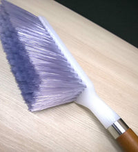 Efficient household cleaning brush with firm bristles