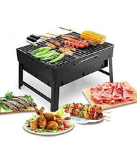 Black charcoal grill oven with cooking surface