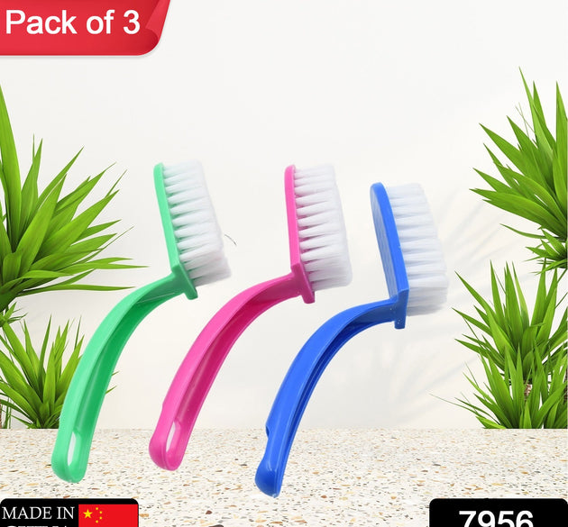 Set of three multi-purpose kitchen cleaning brushes for fish and vegetables.