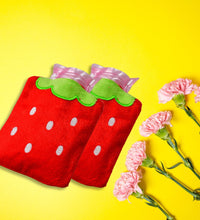 Mini hot water bag with strawberry design for neck and shoulder pain.