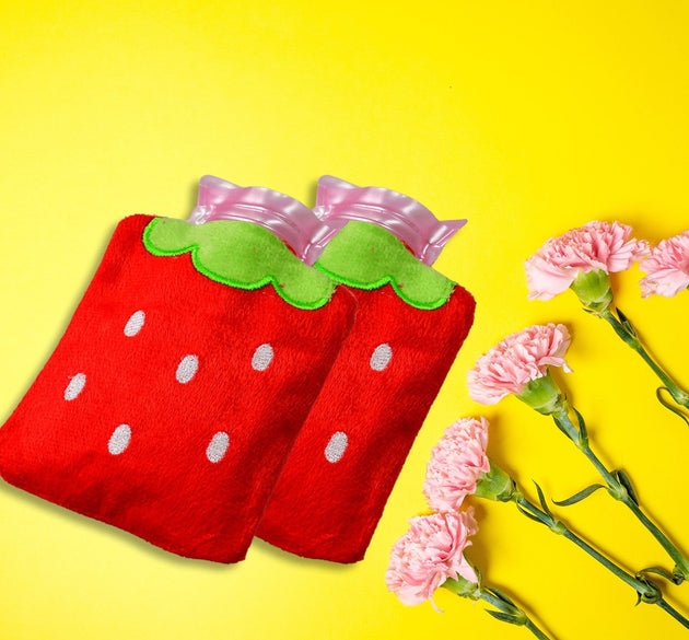 Mini hot water bag with strawberry design for neck and shoulder pain.