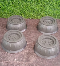 Vibration dampening pads with suction cups