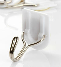 White plastic hook for hanging kitchen towels.