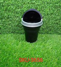 Compact multicolor car dustbin, ideal for use while traveling.