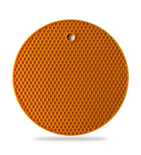 Hot mat made from silicone, showing its ability to handle high temperatures.