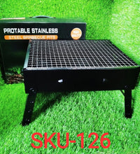 Black folding barbeque grill with side handles