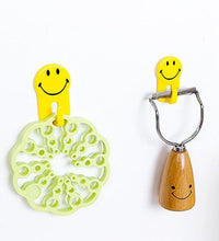 Adhesive hooks with smiley faces