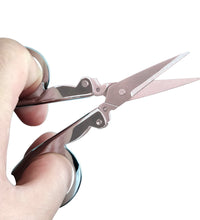 Folding scissors for cutting tasks