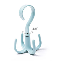 360-degree rotating purse rack with 4 claws.