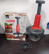 Compact hand press chopper with matte finish, 3 blades, full view