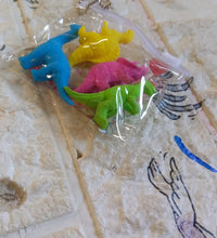 Set of dinosaur erasers for children’s school supplies