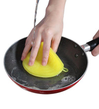 Non-stick silicone scrubber sponge, resistant to heat and mildew.